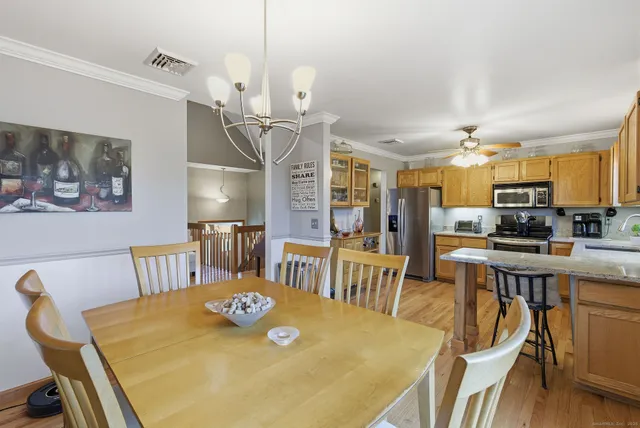 a view of a dining room with furniture