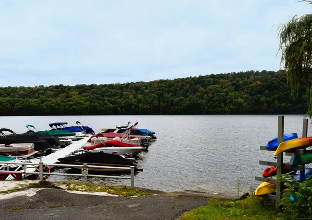 a terrace view with sitting space and lake view