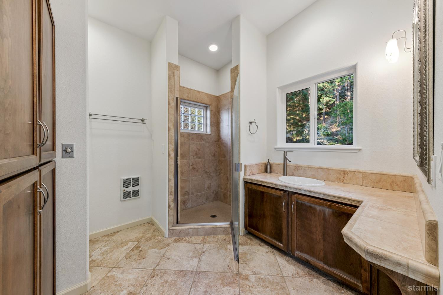 3960 Saddle Road South Lake Tahoe, CA 96150 - Photo 40 of 40 a bathroom with a sink a toilet and shower