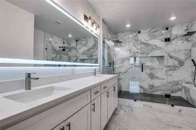 a view of a hallway with stairs