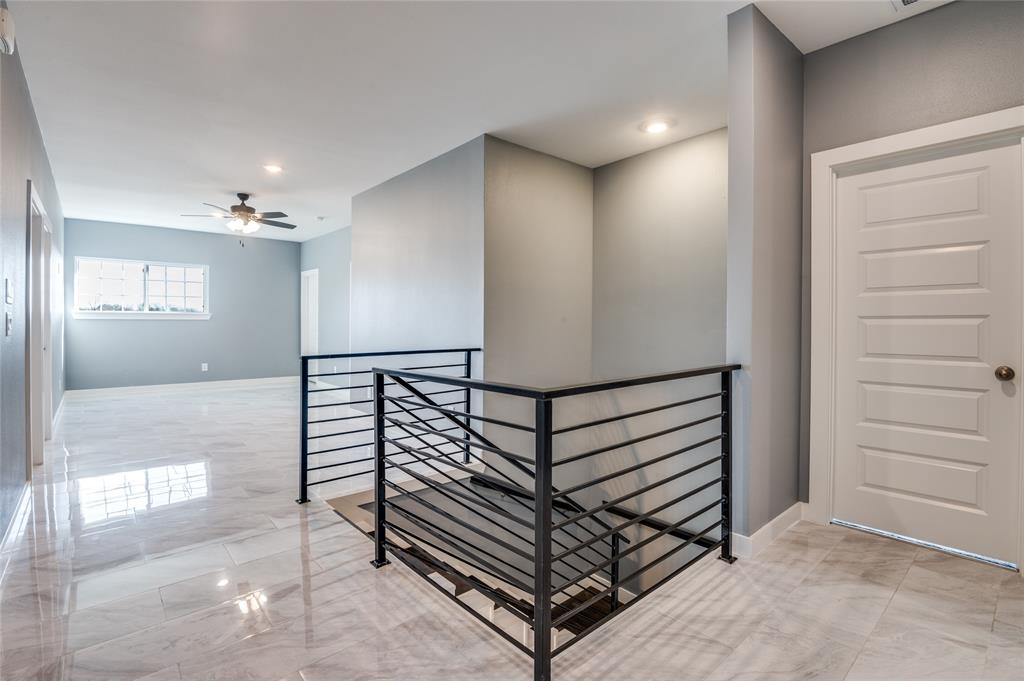 301 South Stewart Avenue Lancaster, TX 75146 - Photo 18 of 35 a view of a hallway with stairs