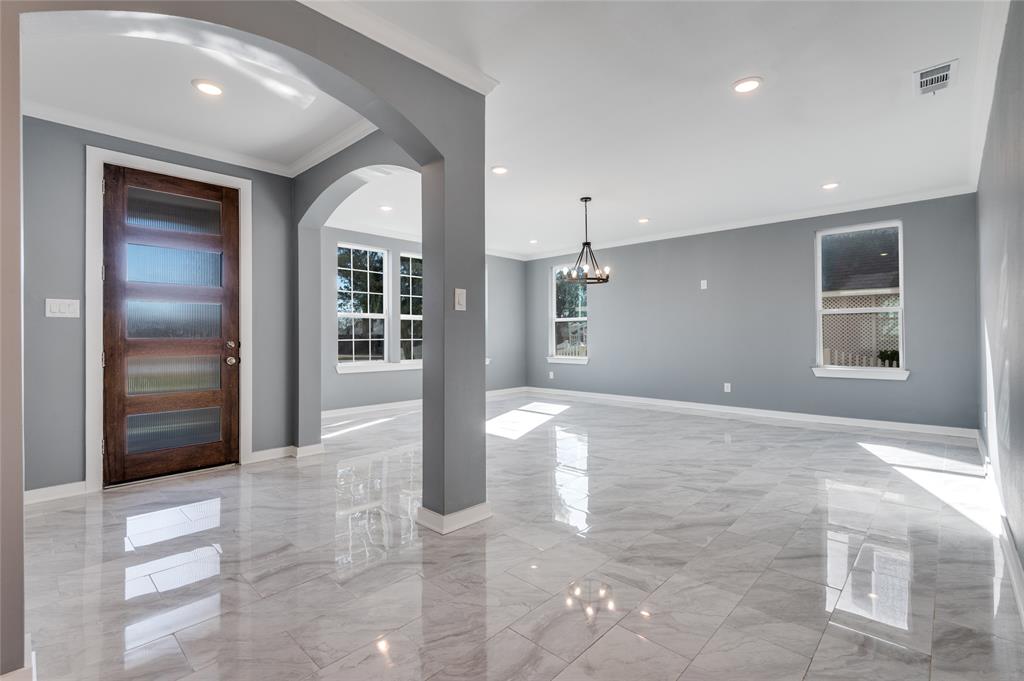 301 South Stewart Avenue Lancaster, TX 75146 - Photo 3 of 35 a view of an empty room and a window