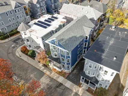 an aerial view of a house with balcony