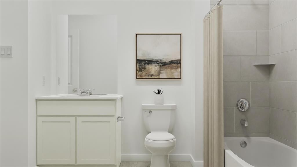 1237 Haggetts Pond Road Forney, TX 75126 - Photo 2 of 29 a bathroom with a sink a toilet and shower