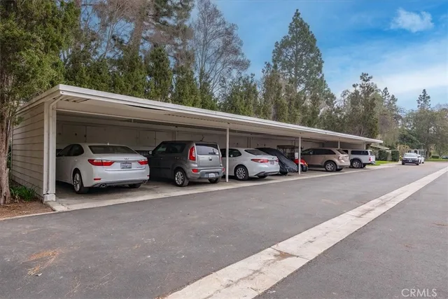 a view of a car parked in front of a building