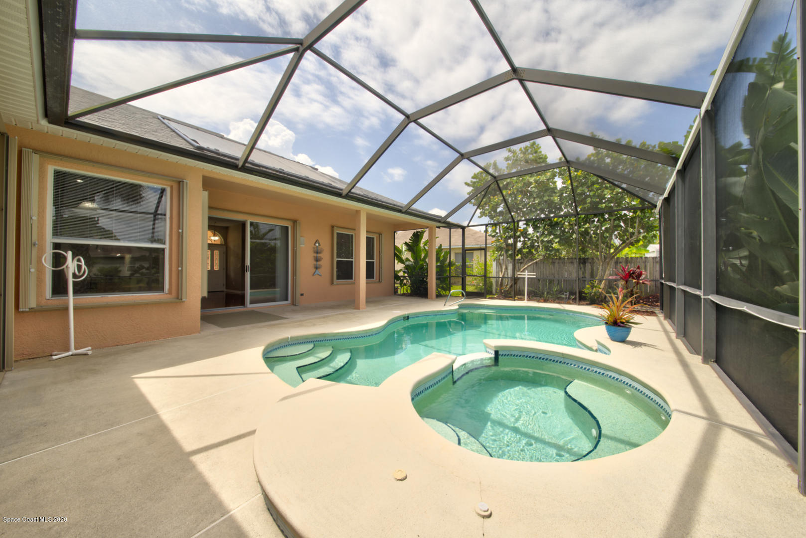 581 Raleigh Road Southeast Palm Bay, FL 32909 - Photo 18 of 60 screened in pool & spa