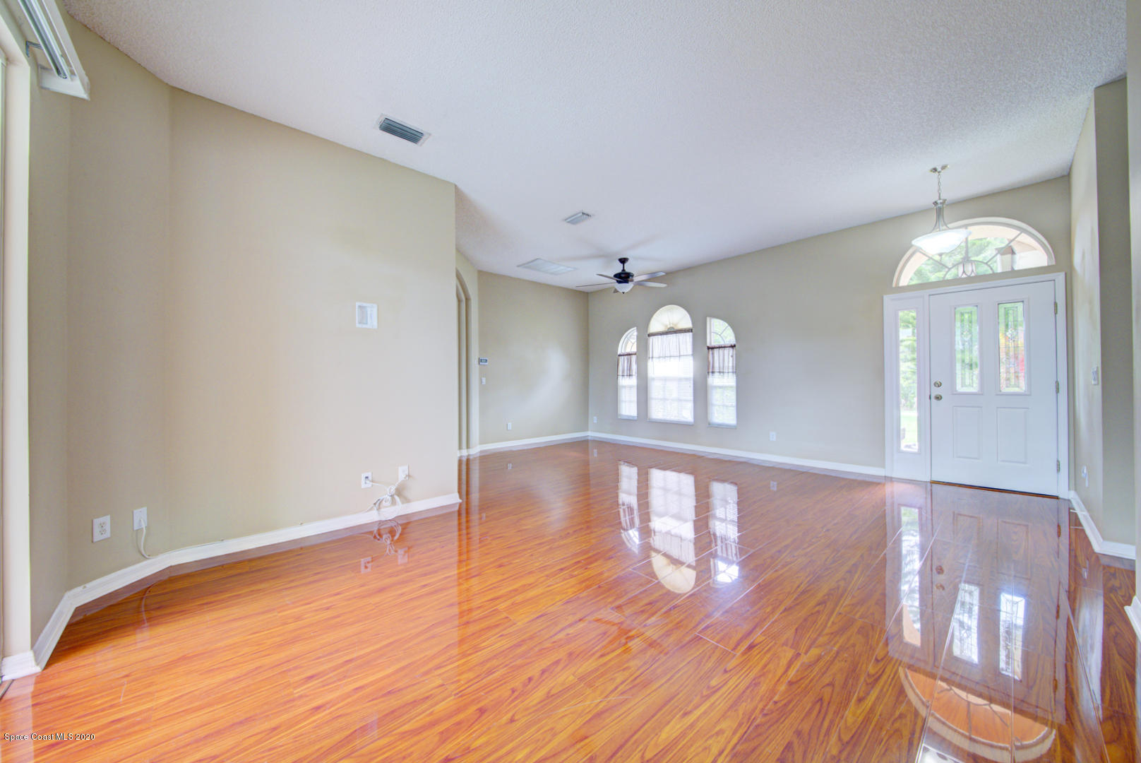 581 Raleigh Road Southeast Palm Bay, FL 32909 - Photo 24 of 60 living room & foyer