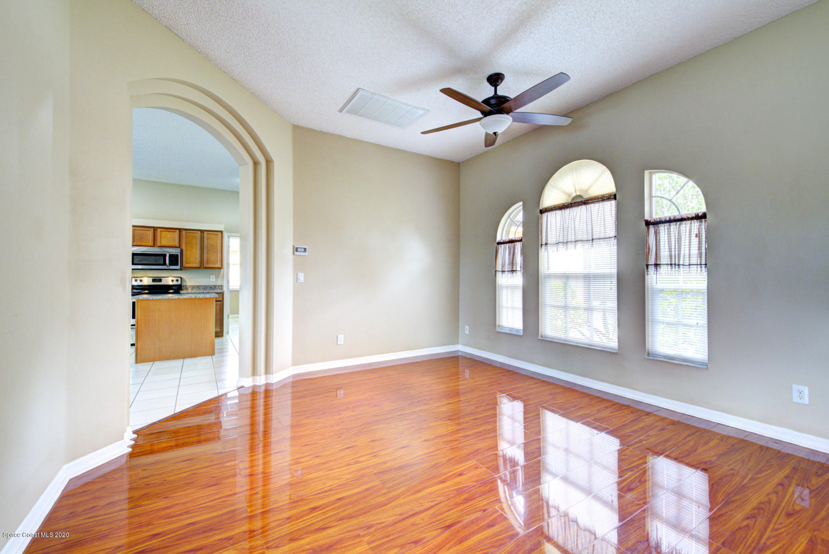 581 Raleigh Road Southeast Palm Bay, FL 32909 - Photo 25 of 60 dining room off kitchen