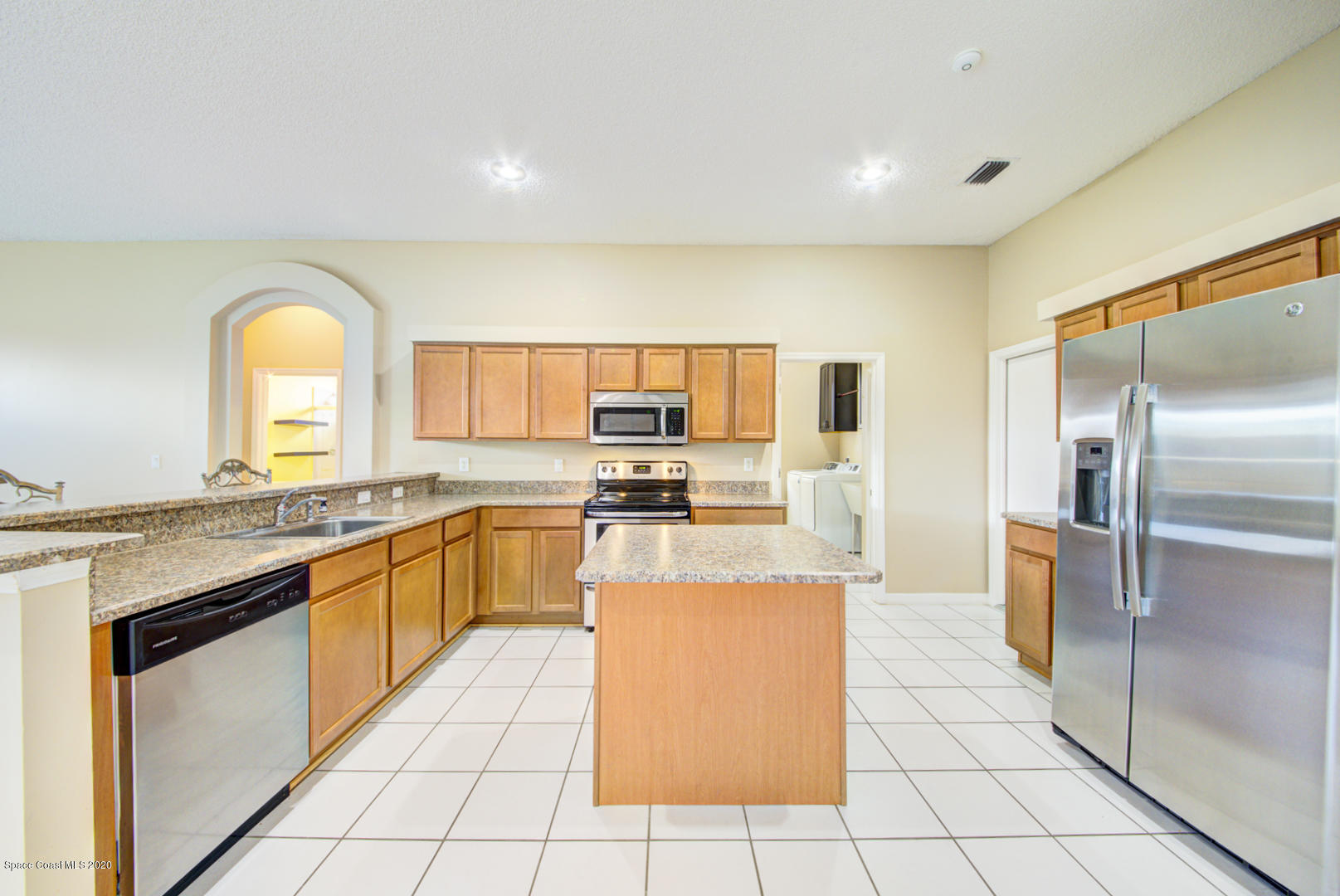 581 Raleigh Road Southeast Palm Bay, FL 32909 - Photo 33 of 60 kitchen with tile floor