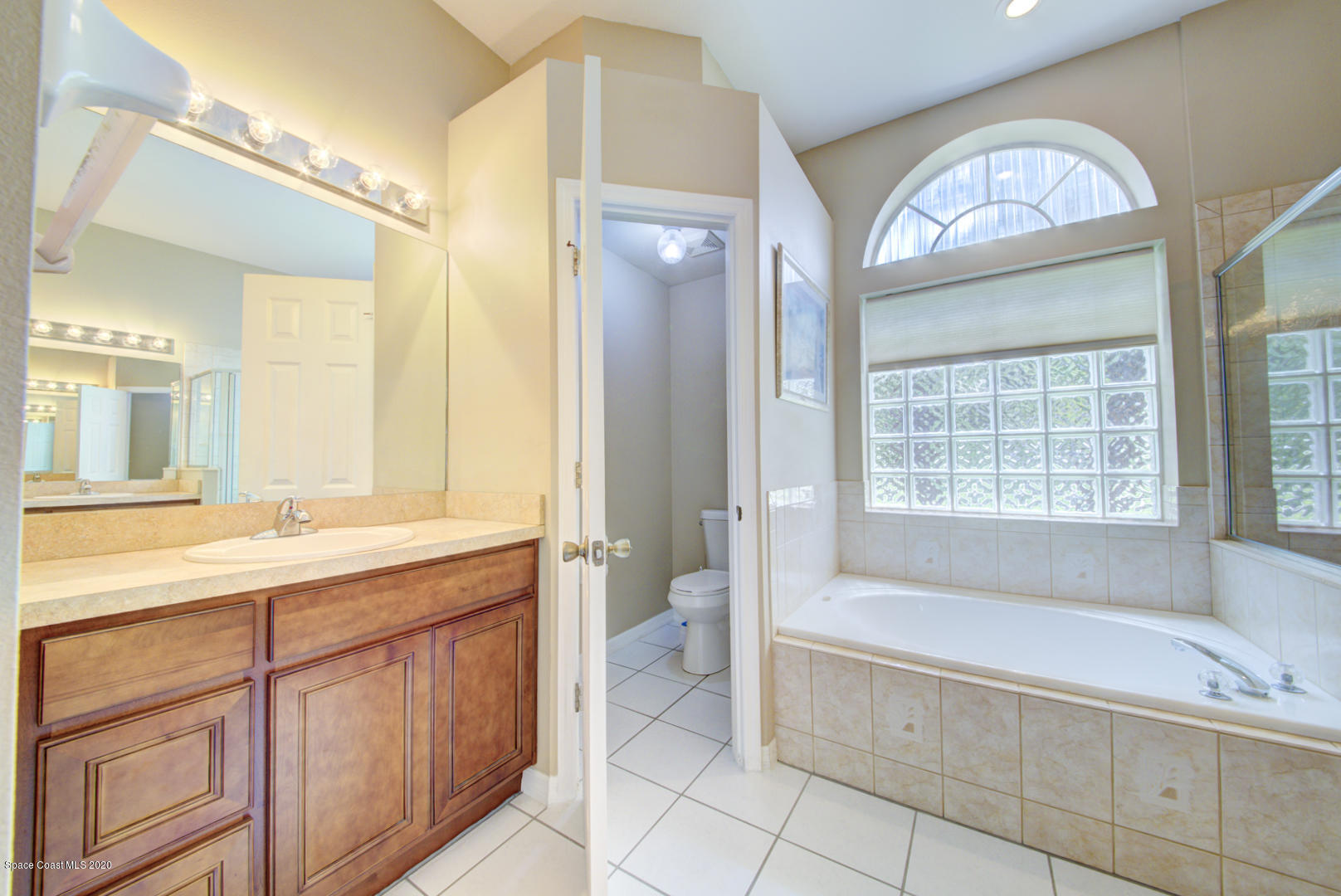 581 Raleigh Road Southeast Palm Bay, FL 32909 - Photo 45 of 60 master bathroom with water closet