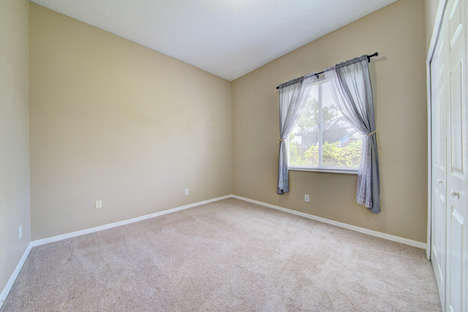 581 Raleigh Road Southeast Palm Bay, FL 32909 - Photo 53 of 60 bedroom 2 view from door