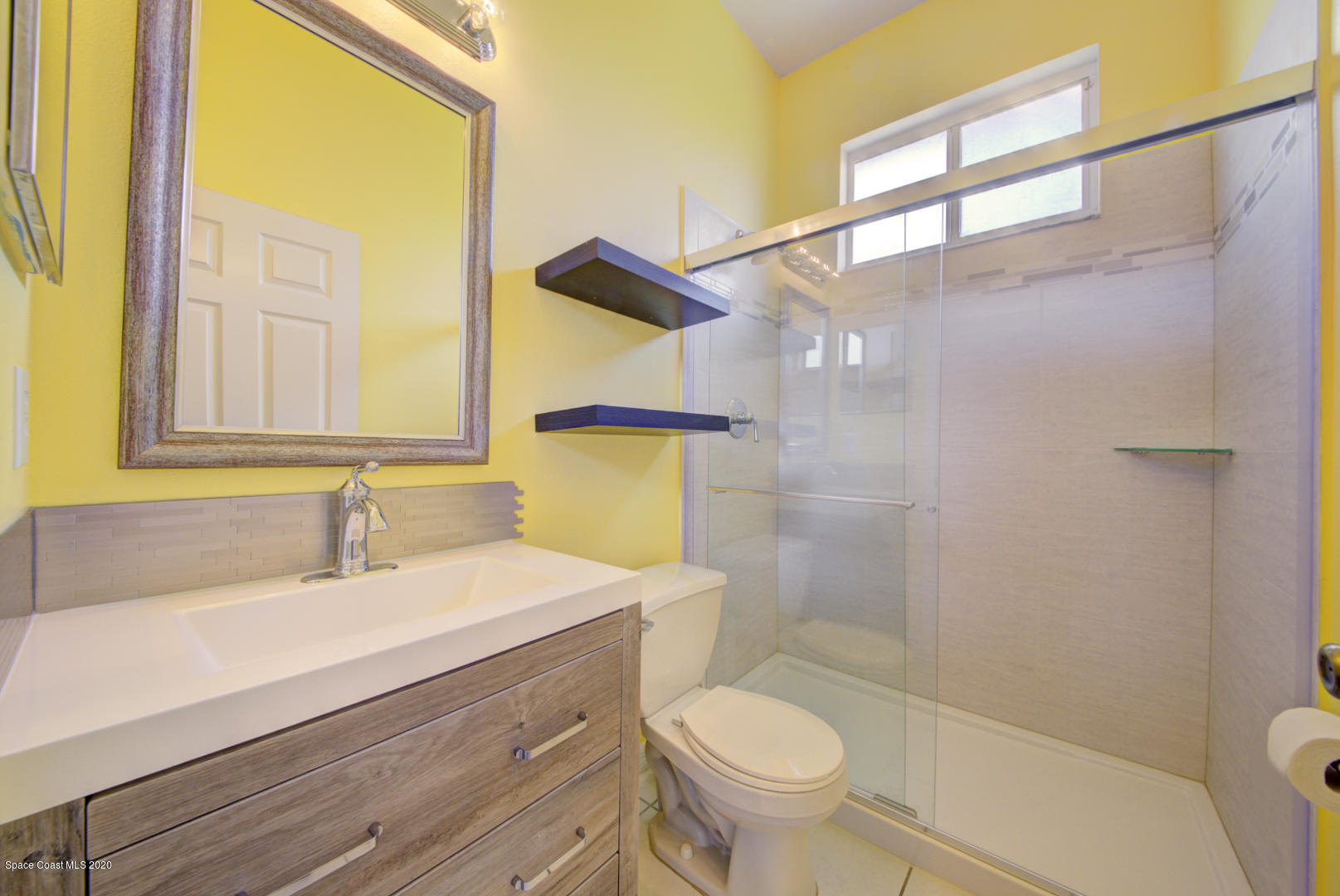 581 Raleigh Road Southeast Palm Bay, FL 32909 - Photo 55 of 60 bathroom 2
