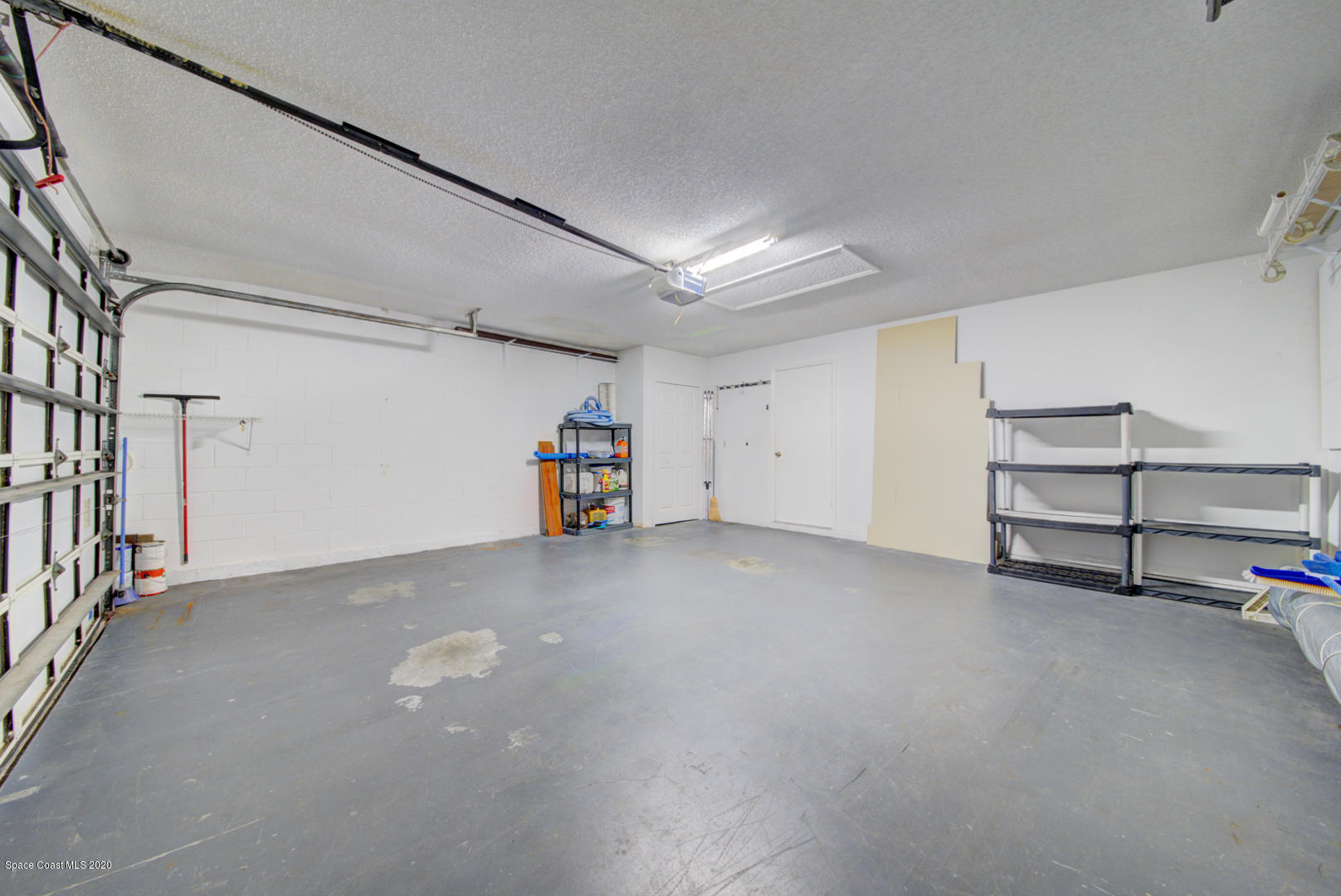 581 Raleigh Road Southeast Palm Bay, FL 32909 - Photo 7 of 60 2 car garage