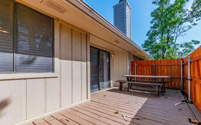 a view of deck with wooden floor and chair