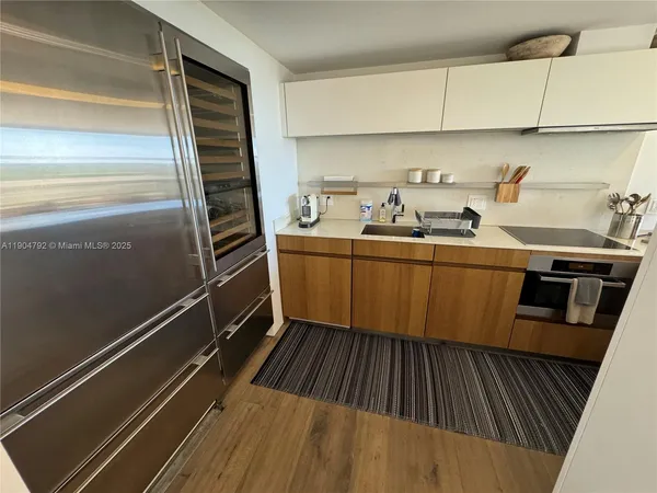 a swimming pool with outdoor seating and yard