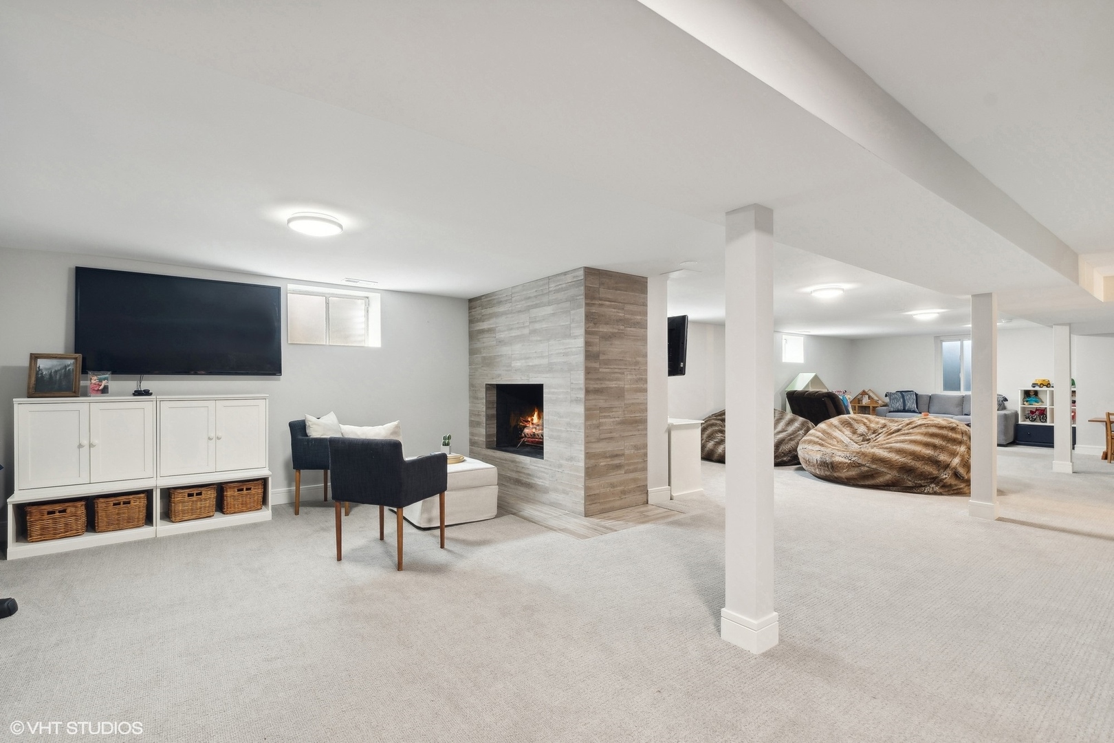 269 Riverside Drive Northfield, IL 60093 - Photo 19 of 28 a living room with furniture and a flat screen tv
