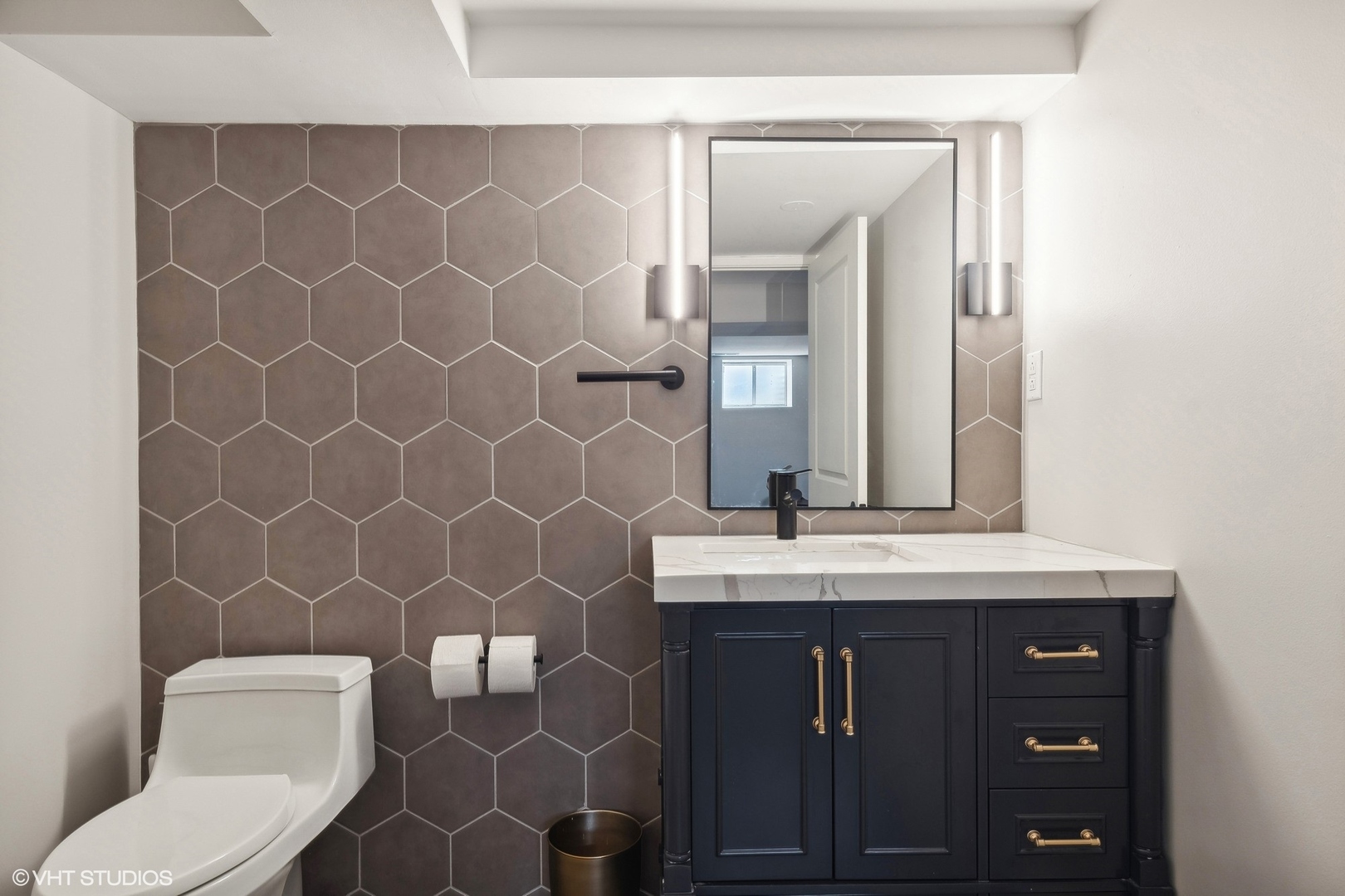 269 Riverside Drive Northfield, IL 60093 - Photo 22 of 28 a bathroom with a sink mirror vanity and toilet