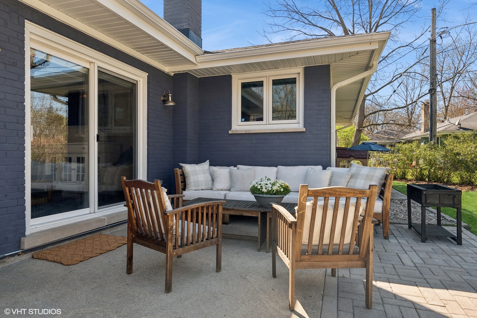 269 Riverside Drive Northfield, IL 60093 - Photo 23 of 28 a view of a chair and table in the patio