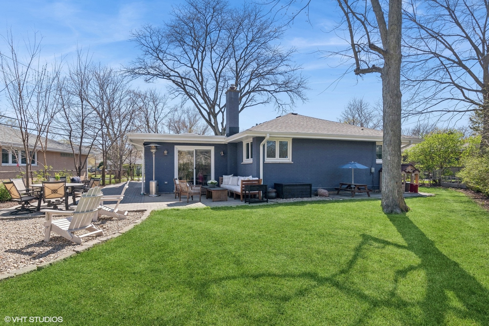 269 Riverside Drive Northfield, IL 60093 - Photo 26 of 28 a view of a house with a yard porch and sitting area