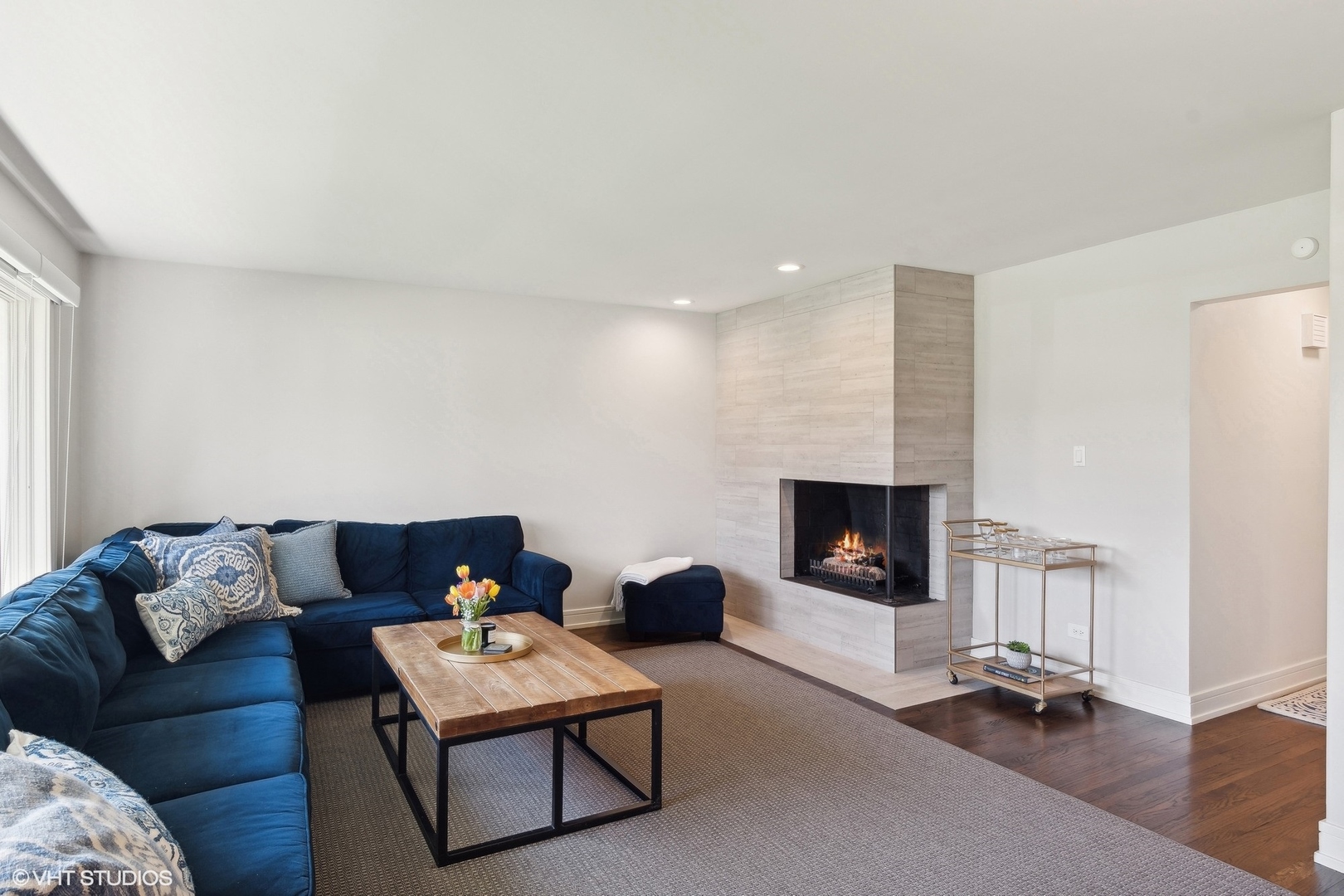 269 Riverside Drive Northfield, IL 60093 - Photo 3 of 28 a living room with furniture and a fireplace