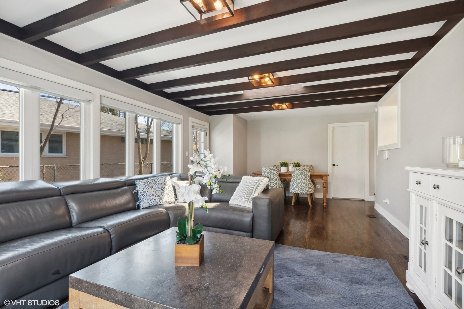 269 Riverside Drive Northfield, IL 60093 - Photo 10 of 28 a living room with furniture and a fireplace