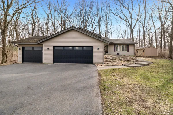 a house with trees in front of it