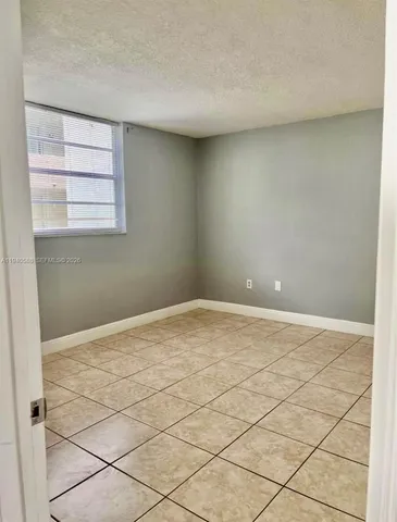 a view of a room with a window