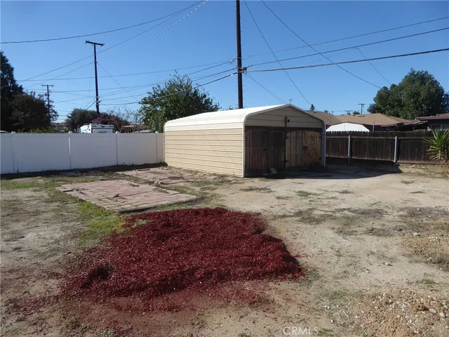 a black and white house with a outdoor space