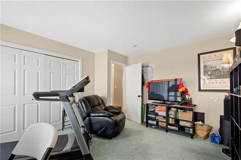 a room with furniture and a flat screen tv