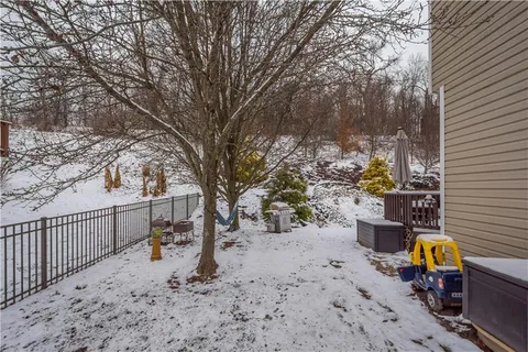 a view of a backyard of the house