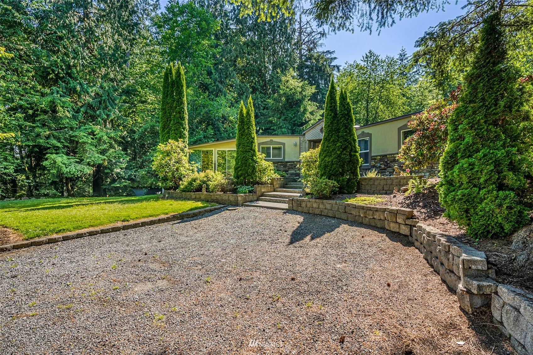 1210 Helm Road Snohomish, WA 98290 - Photo 5 of 38 a view of a swimming pool with a patio and a yard