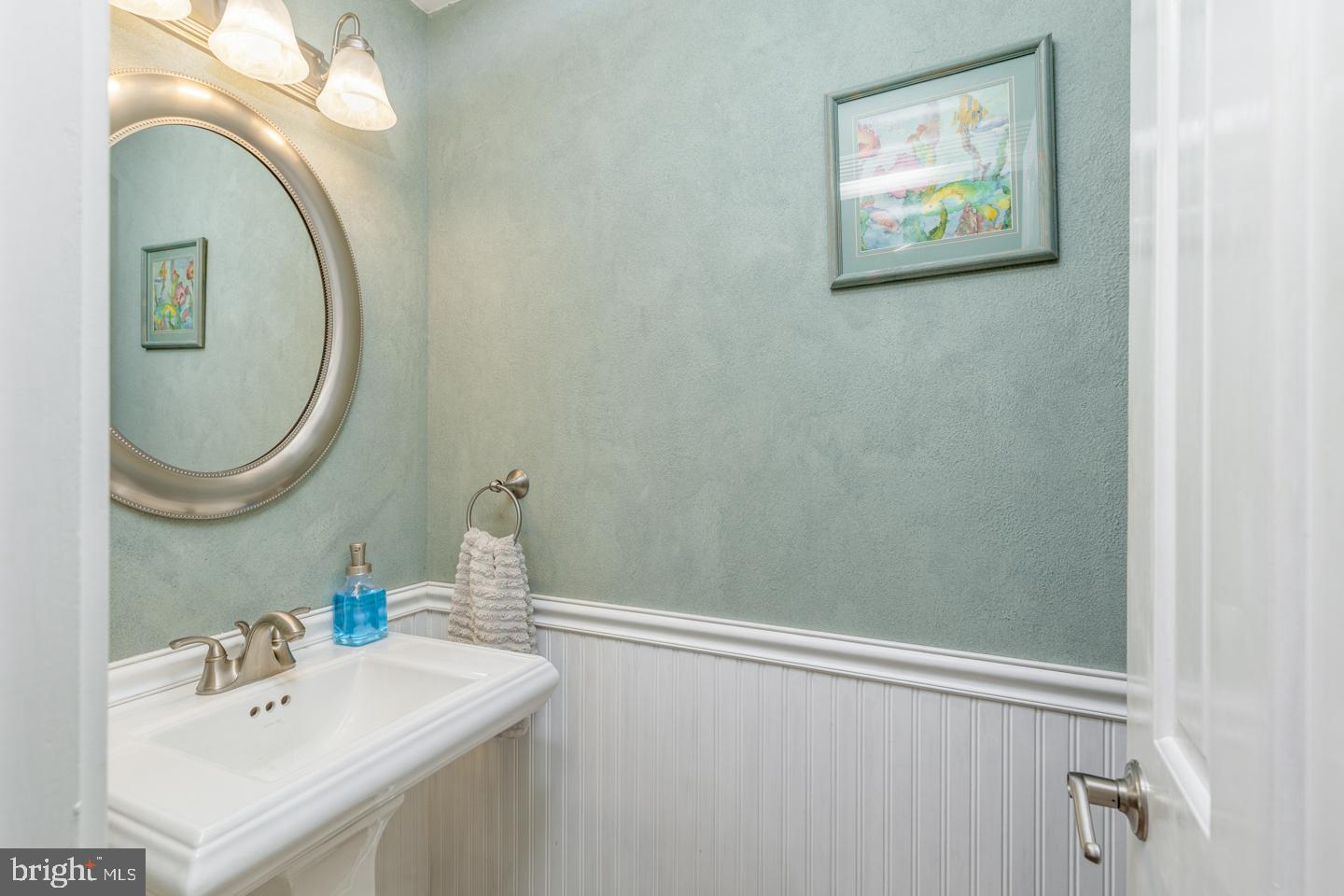 110 Wexford Drive Cherry Hill, NJ 08003 - Photo 21 of 51 a bathroom with a sink and a mirror