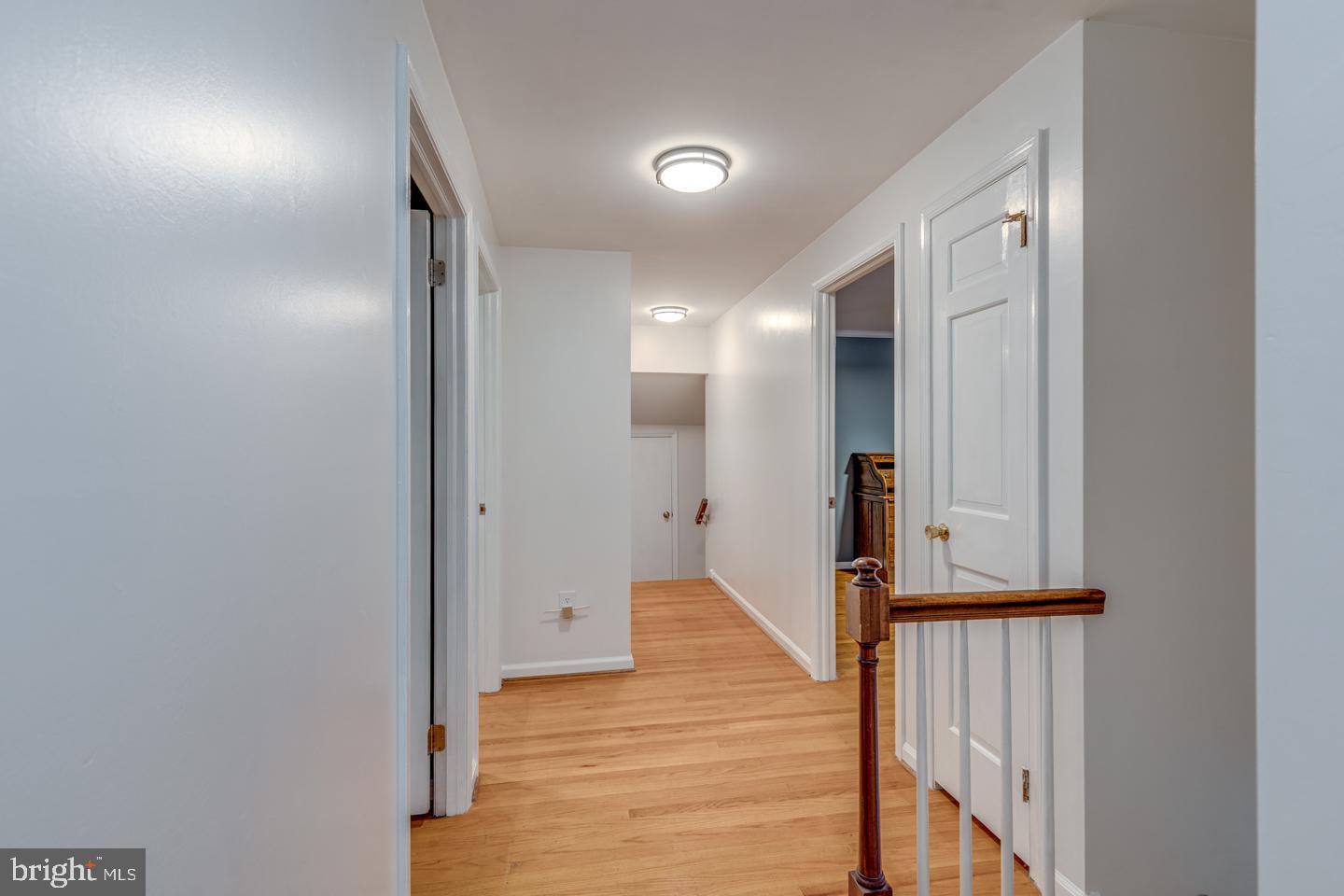 110 Wexford Drive Cherry Hill, NJ 08003 - Photo 25 of 51 a view of a hallway with wooden floor