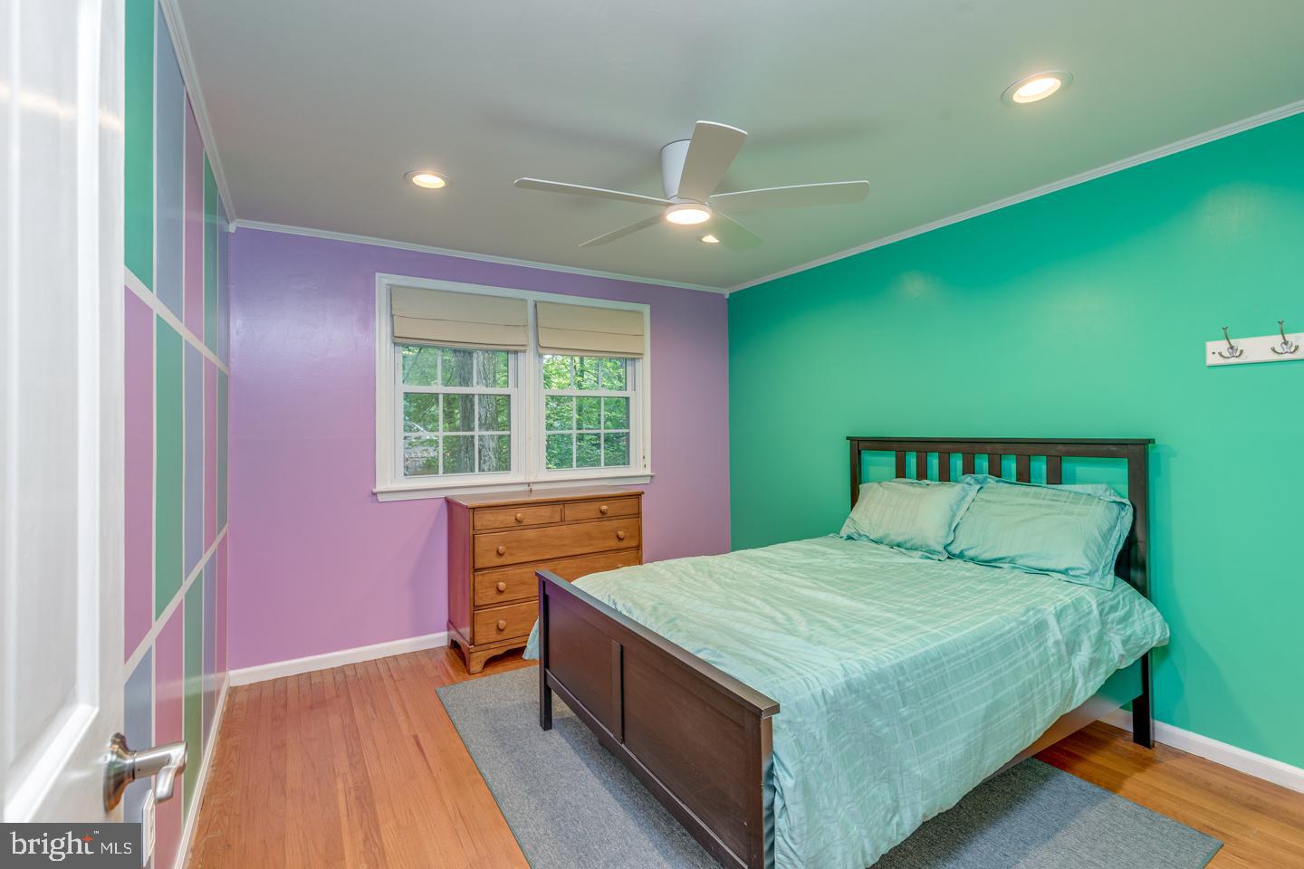 110 Wexford Drive Cherry Hill, NJ 08003 - Photo 28 of 51 a bedroom with a bed and a dresser next to a window