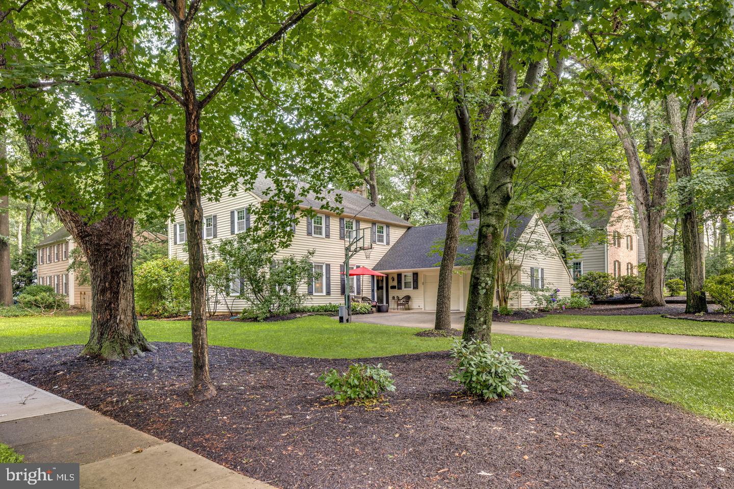 110 Wexford Drive Cherry Hill, NJ 08003 - Photo 3 of 51 a front view of a house with a yard and tree s