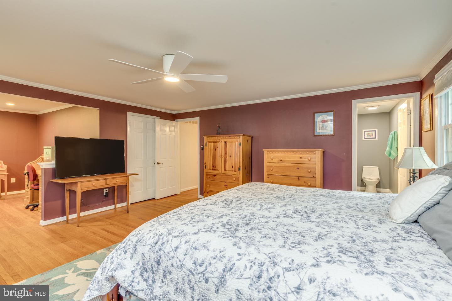 110 Wexford Drive Cherry Hill, NJ 08003 - Photo 36 of 51 a bedroom with a bed and a flat screen tv on dresser