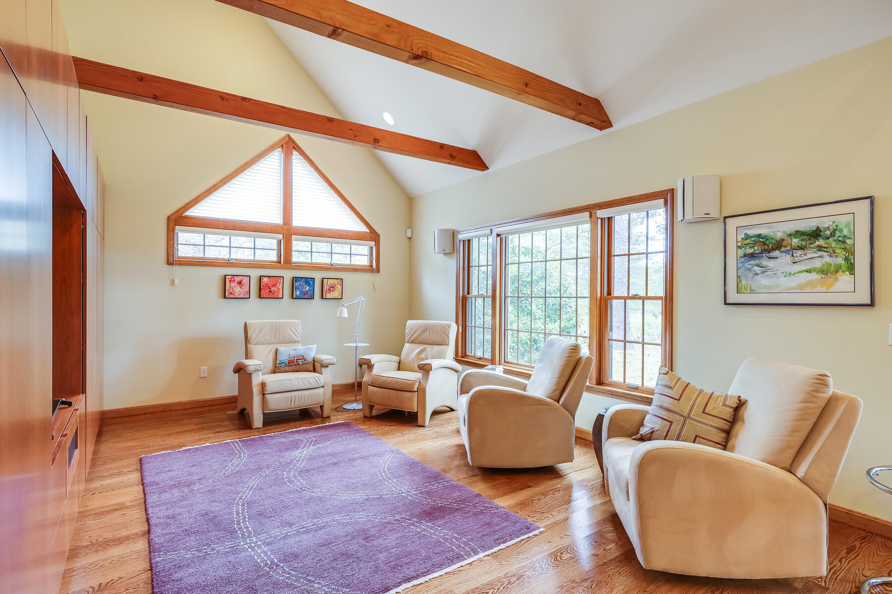 375 Eastwind Circle Wellfleet, MA 02667 - Photo 16 of 59 a living room with furniture and a large window