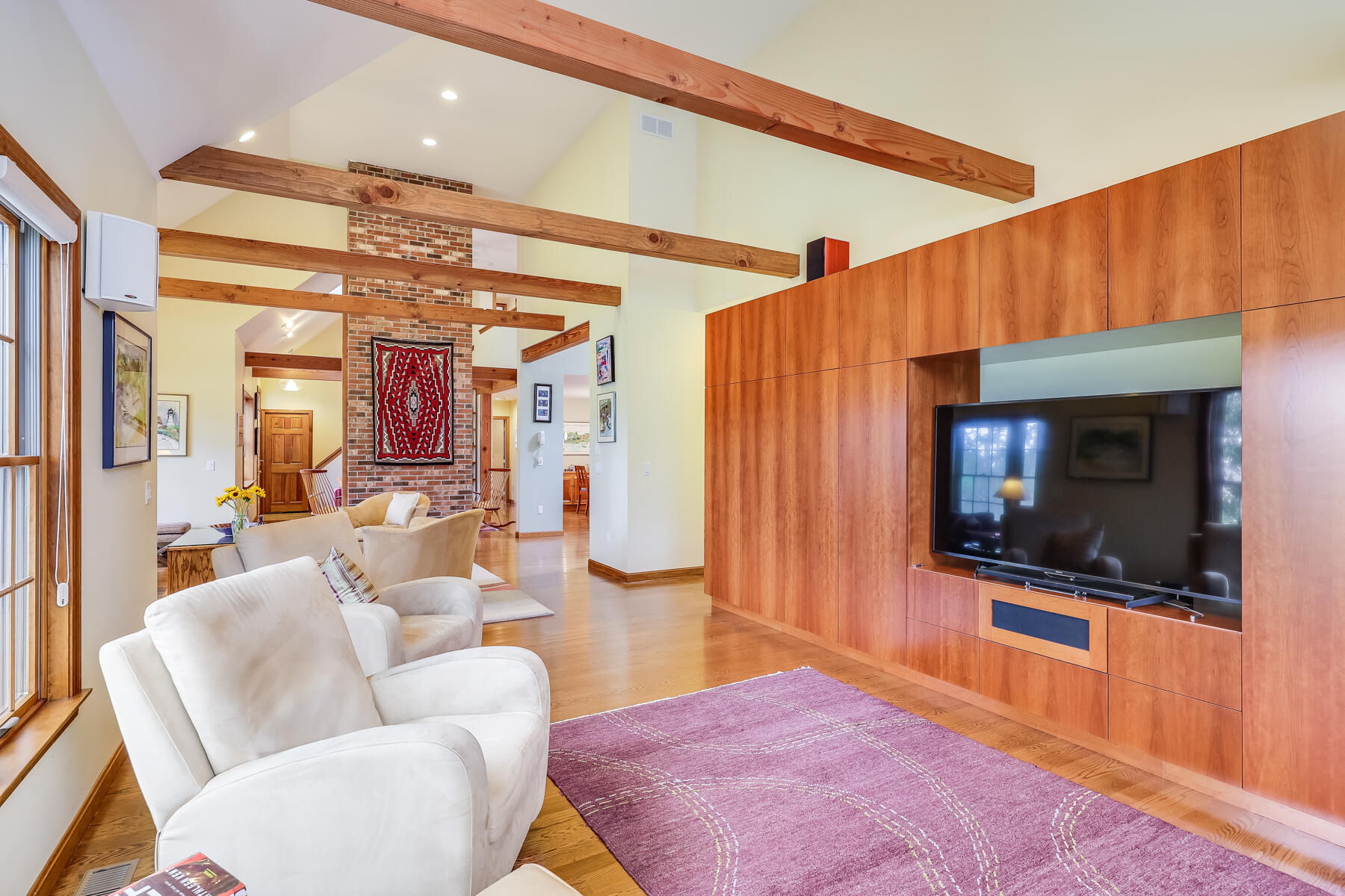 375 Eastwind Circle Wellfleet, MA 02667 - Photo 17 of 59 a living room with furniture and a flat screen tv