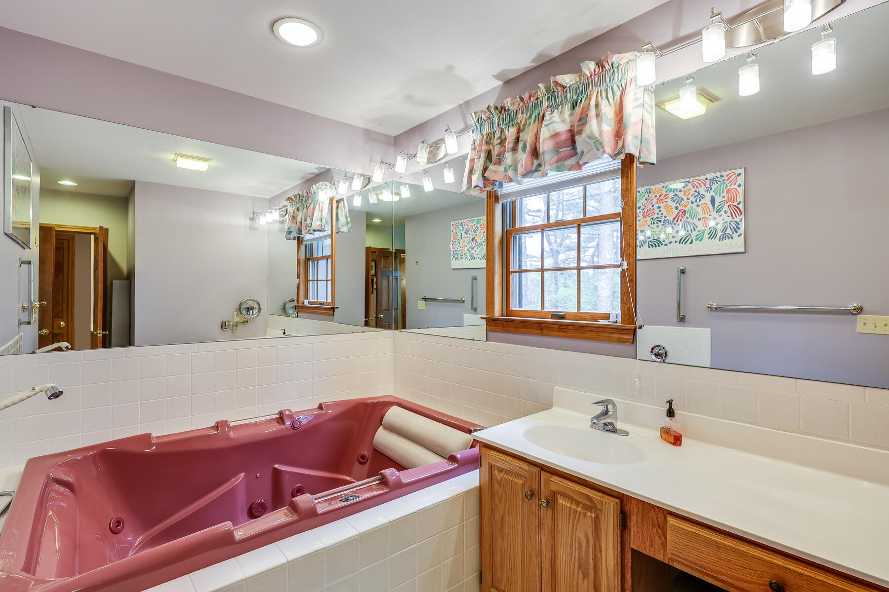 375 Eastwind Circle Wellfleet, MA 02667 - Photo 23 of 59 a bathroom with a sink and a mirror