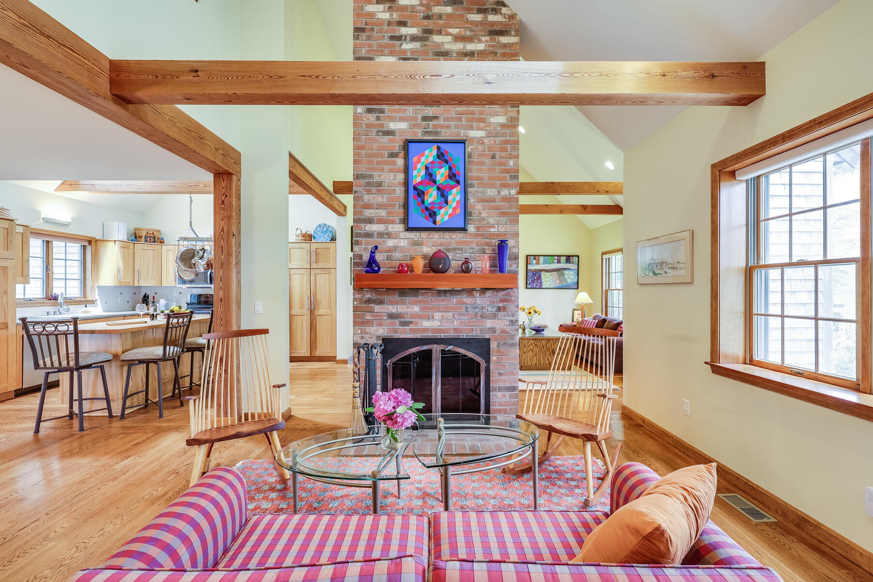 375 Eastwind Circle Wellfleet, MA 02667 - Photo 5 of 59 a living room with furniture and a fireplace