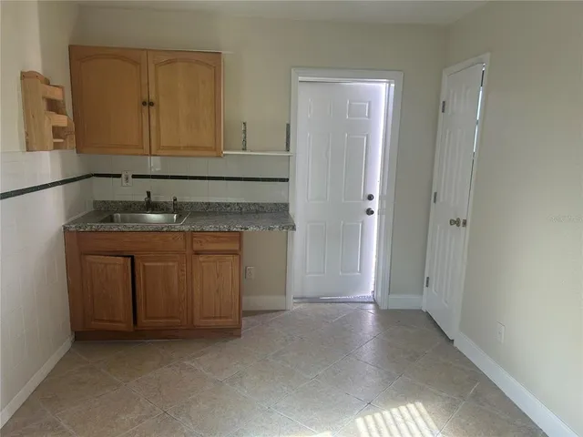 a view of a wrought iron fences in front of house