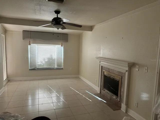 a living room with a fireplace