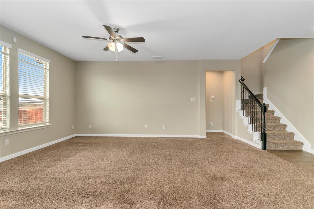 1102 Tiburon Trail Cleburne, TX 76033 - Photo 9 of 36 Unfurnished room featuring ceiling fan and carpet flooring