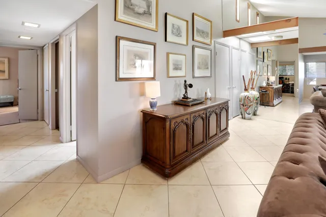 a kitchen with stainless steel appliances a sink stove and cabinets