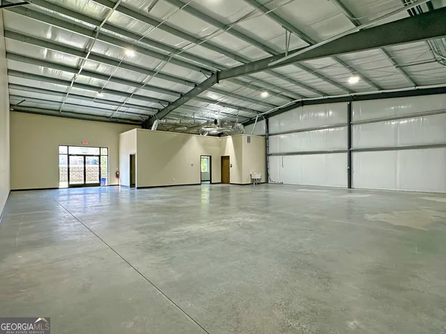 a view of a room with wooden walls