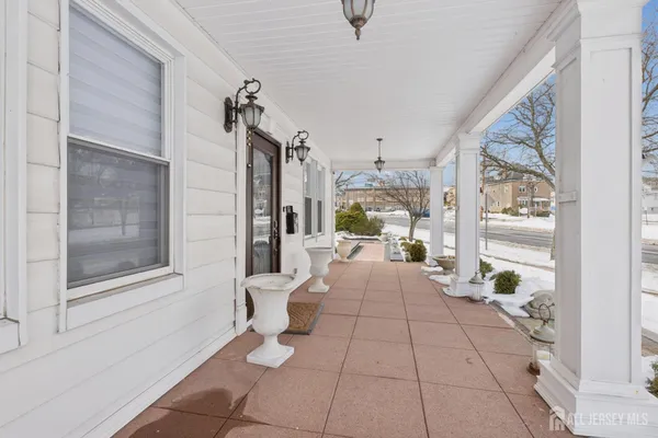 a view of a backyard with sitting area