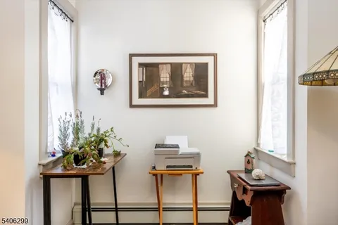 a view of a workspace with furniture