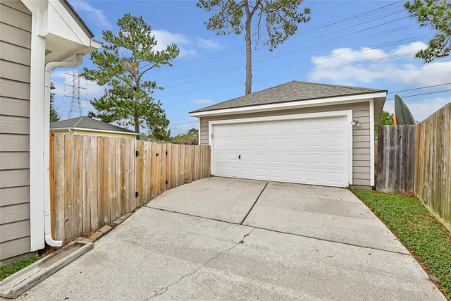 a front view of a house with a garage