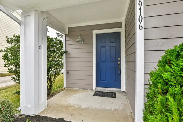 a view of front door with a glass door