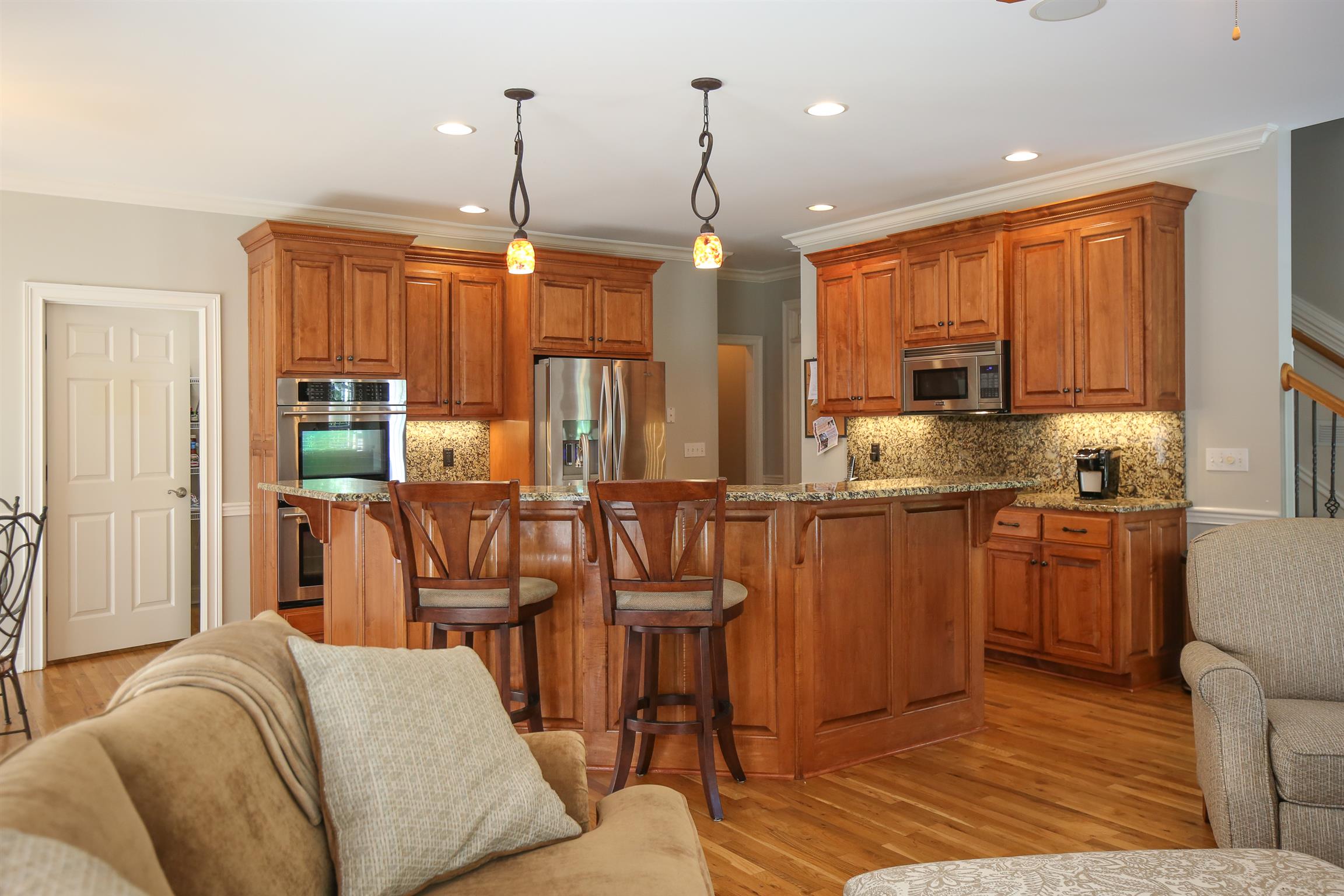 5411 Sherrington Road Murfreesboro, TN 37128 - Photo 19 of 30 Pendant lighting over the granite counter breakfast bar